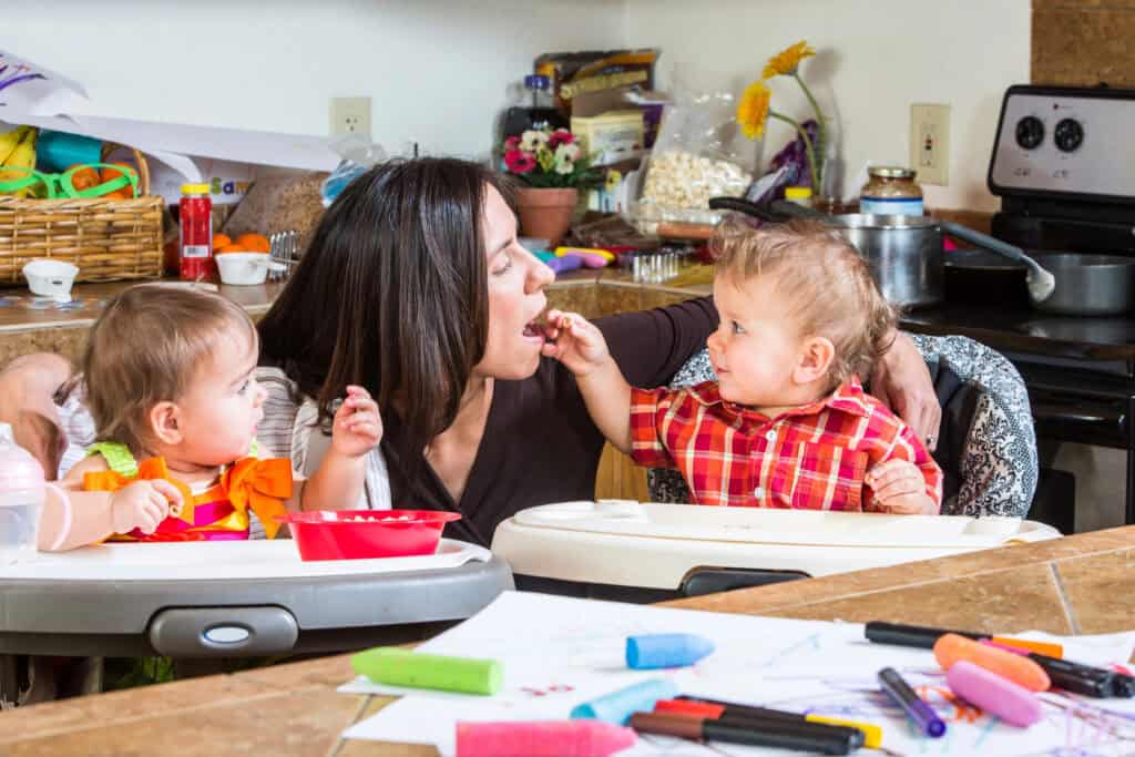 Jesus Never Rushed: Lessons for Busy Mothers, woman feeding her twins