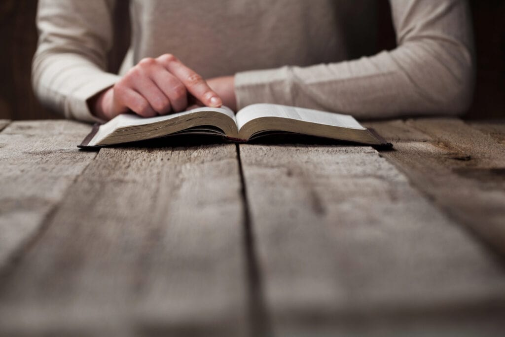 person reading the bible